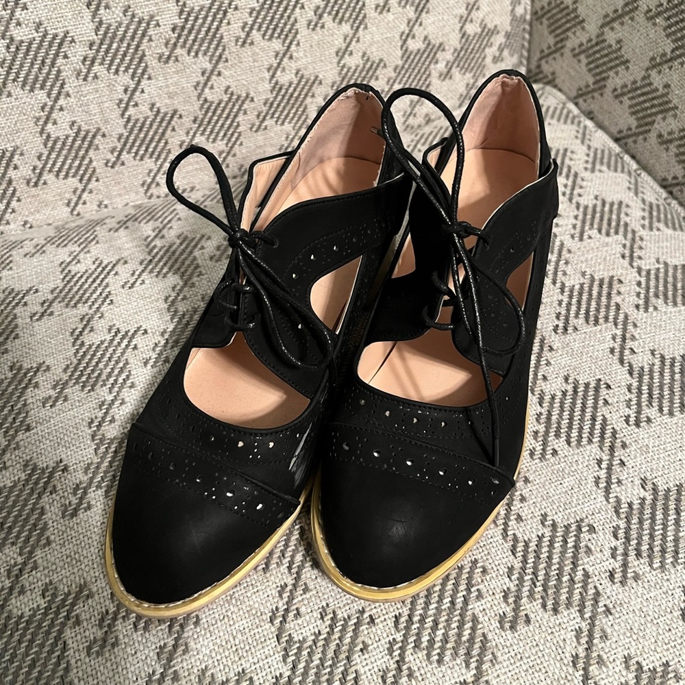 Black lace-up oxfords